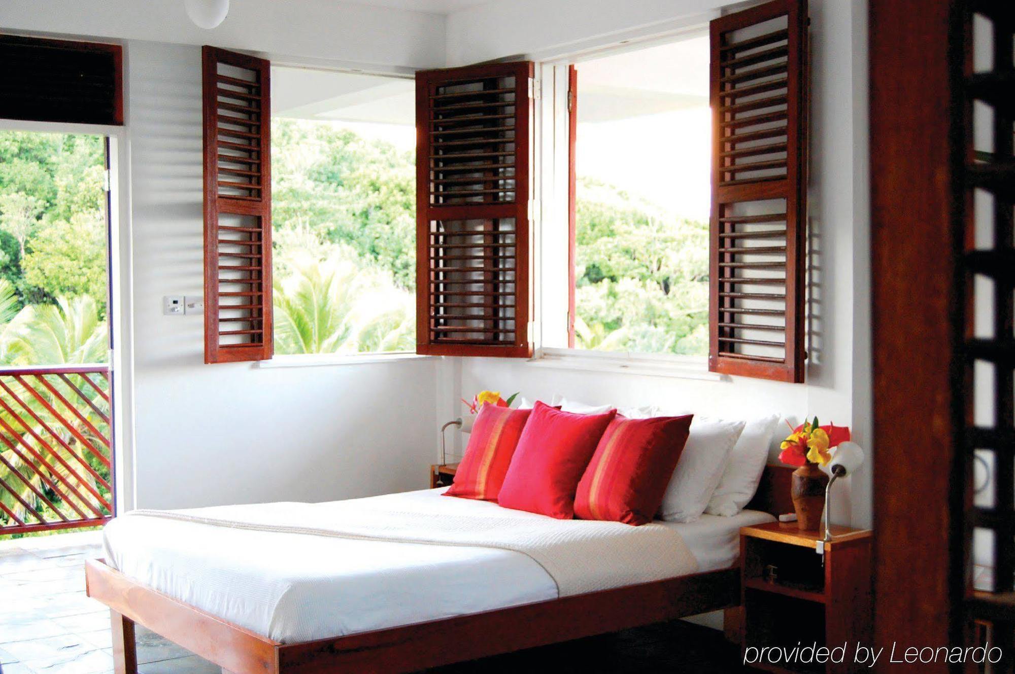 Calibishie Cove Hotel Ruang foto